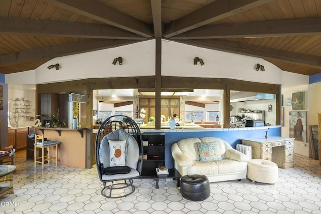 living room with radiator heating unit, wooden ceiling, and vaulted ceiling with beams