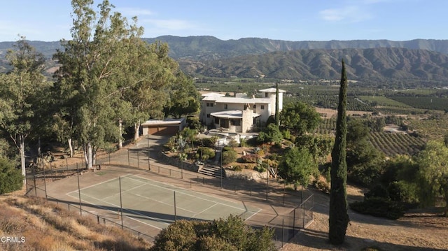 exterior space featuring a mountain view