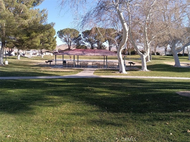 view of home's community with a gazebo and a lawn