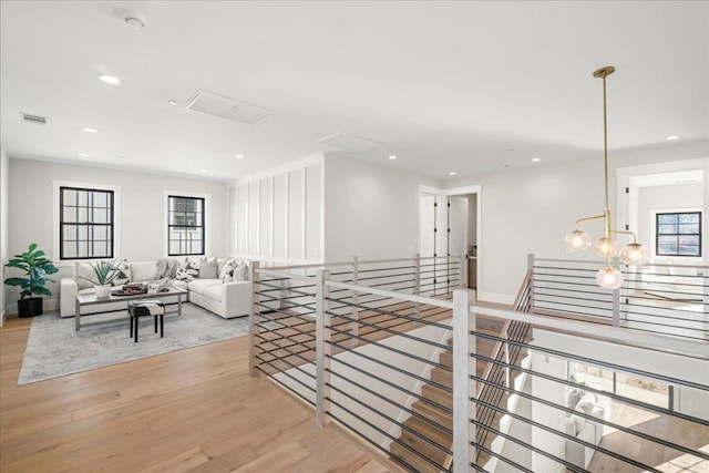 corridor featuring light hardwood / wood-style flooring