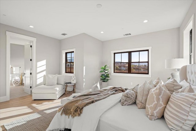 bedroom featuring light hardwood / wood-style flooring