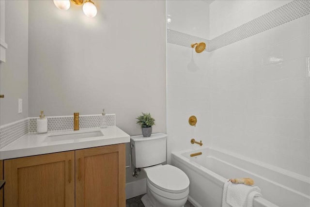 full bathroom with toilet, vanity, and washtub / shower combination