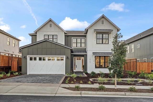 modern farmhouse style home featuring a garage