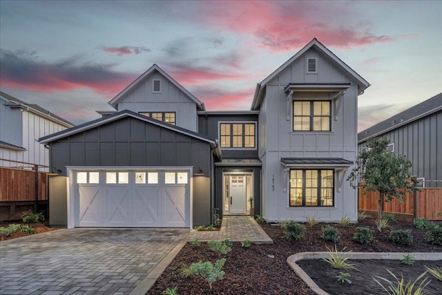 modern farmhouse featuring a garage