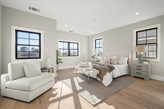 bedroom with light hardwood / wood-style flooring