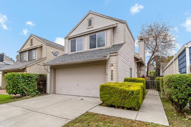 front of property with a garage