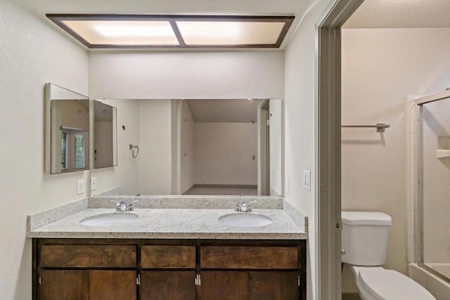 full bathroom featuring toilet, bathing tub / shower combination, and vanity