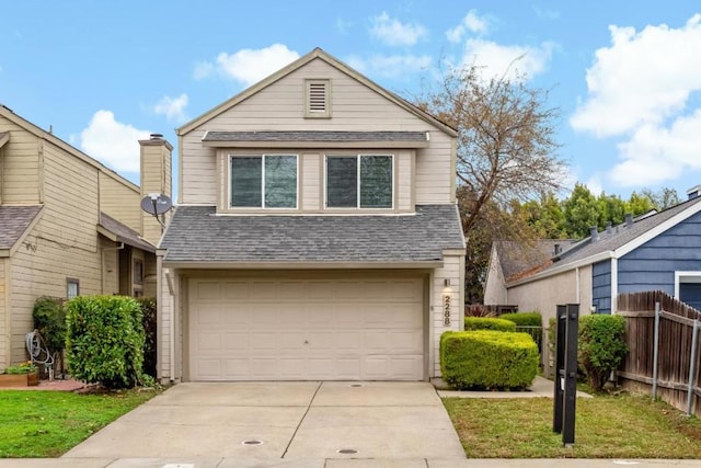 view of front property with a garage