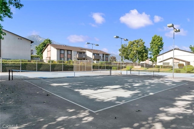 view of sport court featuring a mountain view