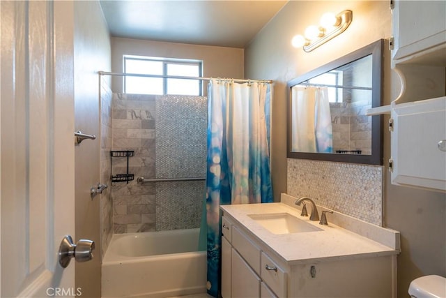 full bathroom with toilet, shower / tub combo with curtain, and vanity