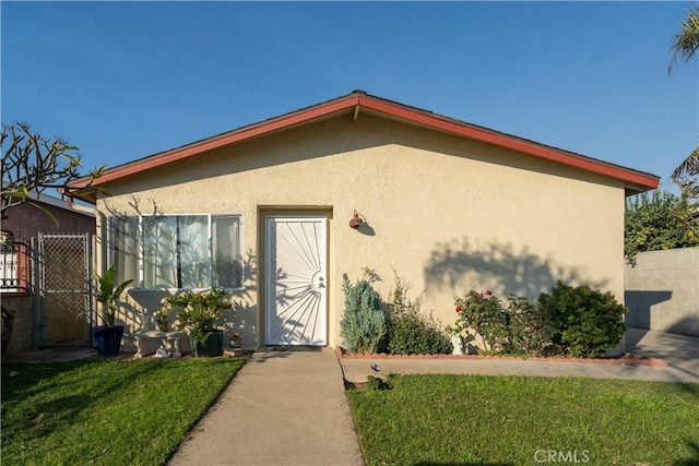 exterior space with a yard