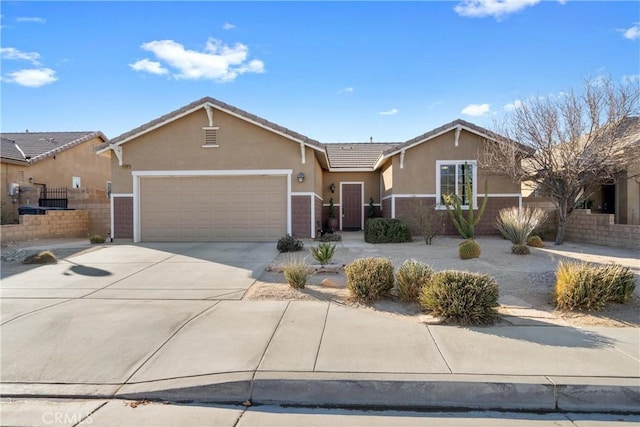 ranch-style home featuring a garage