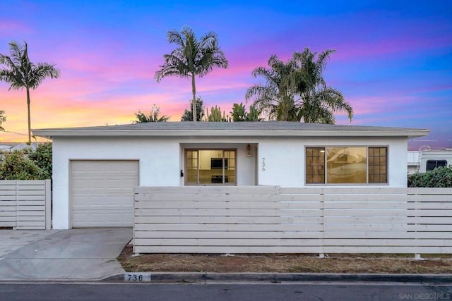 ranch-style home with a garage