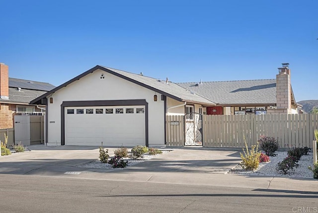 single story home with a garage