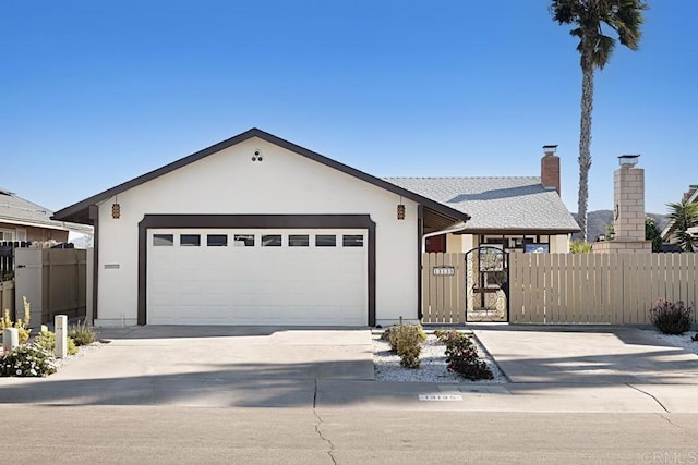 single story home featuring a garage