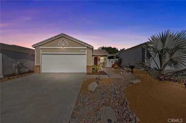 view of front of property featuring a garage