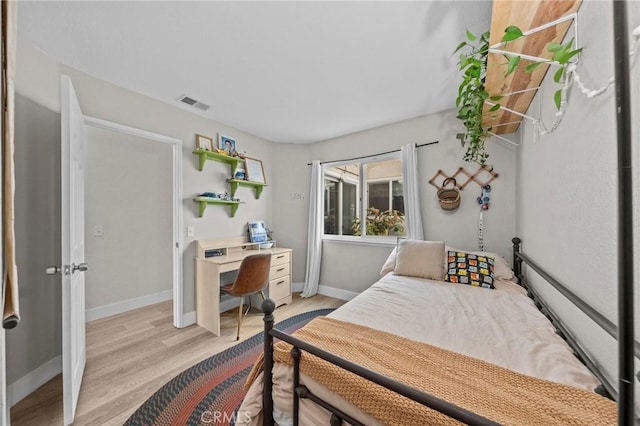 bedroom featuring light wood-type flooring