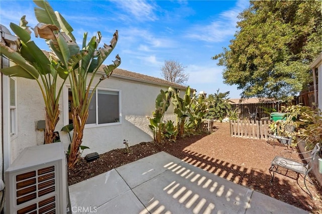 view of patio featuring ac unit