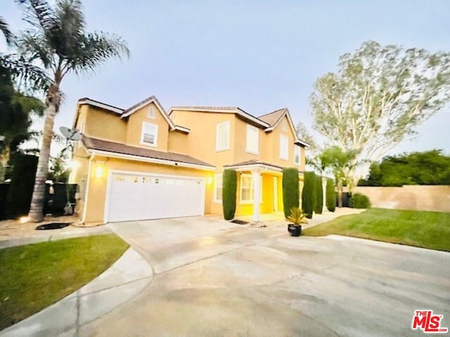 view of front of home with a garage