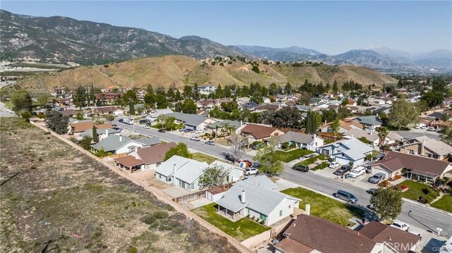 drone / aerial view featuring a mountain view