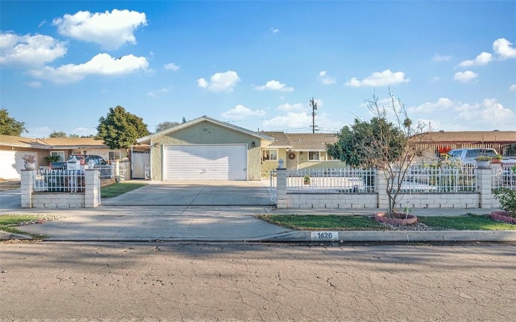 single story home featuring a garage