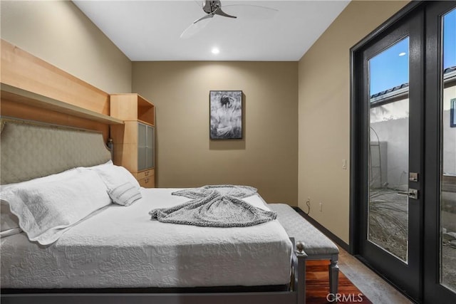 bedroom with ceiling fan and hardwood / wood-style flooring