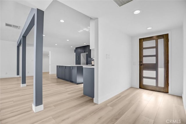 entrance foyer featuring light wood-type flooring