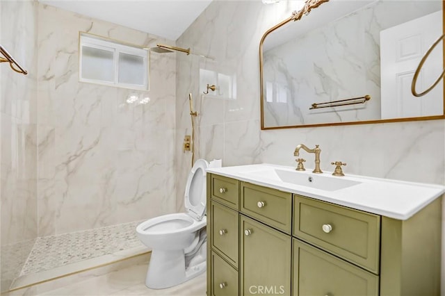 bathroom with walk in shower, vanity, tile walls, and toilet