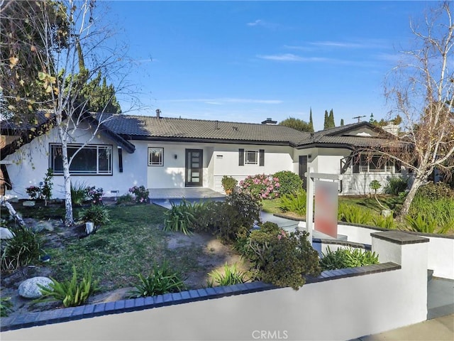 view of front of home featuring a patio area