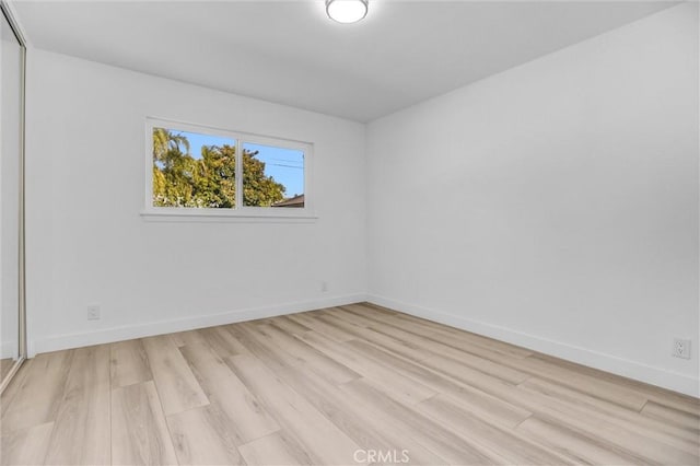 empty room featuring light wood-type flooring