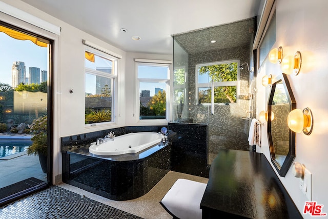 bathroom with tiled bath