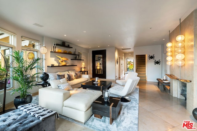 living room featuring light tile patterned floors