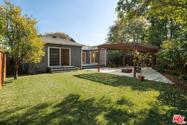 view of yard with a gazebo and a patio