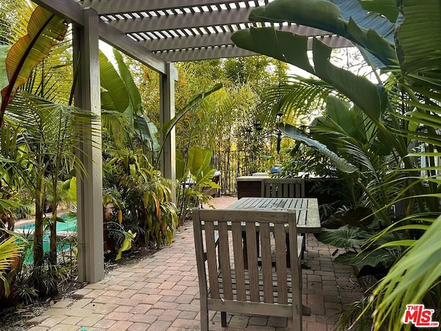 view of patio / terrace featuring a pergola