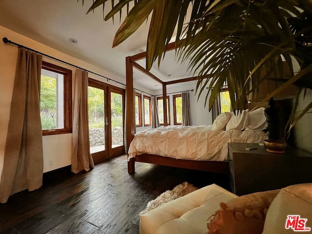 bedroom with french doors, access to exterior, and dark hardwood / wood-style floors