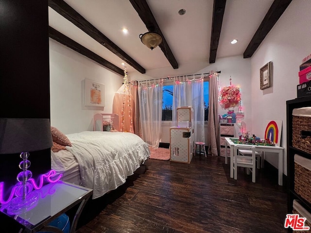 bedroom with beam ceiling and dark hardwood / wood-style floors