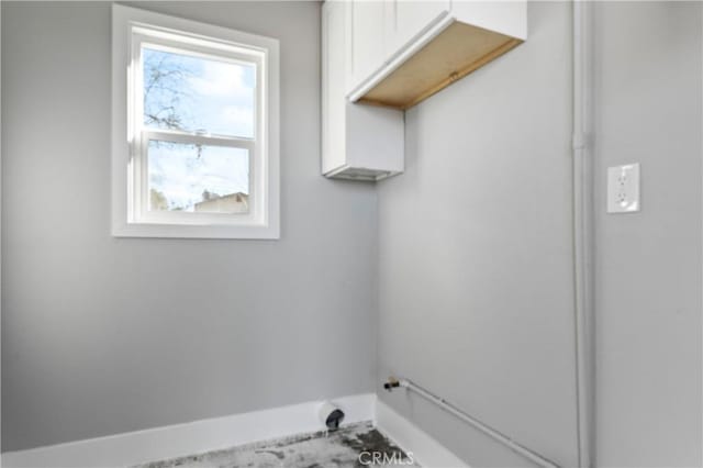 washroom with cabinets