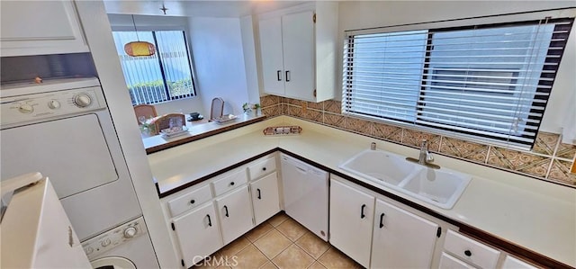 kitchen featuring sink, white cabinetry, and dishwasher