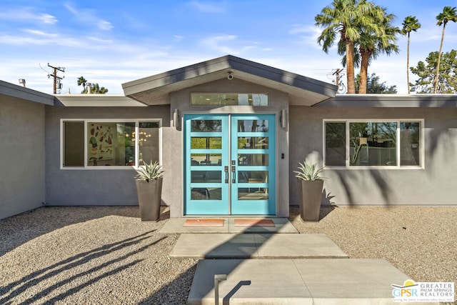 view of exterior entry with french doors