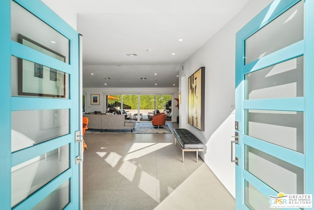 interior space featuring light tile patterned floors