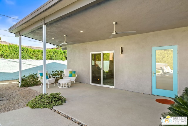 view of patio / terrace featuring ceiling fan