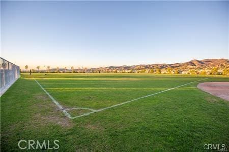 surrounding community featuring a mountain view