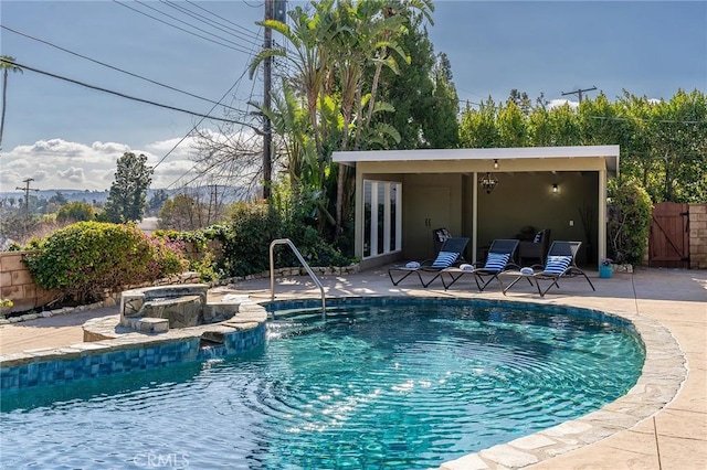 view of swimming pool featuring a patio