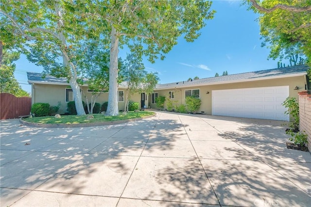 ranch-style home with a garage