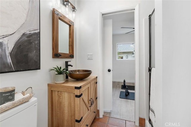 bathroom featuring ceiling fan, tile patterned flooring, vanity, and toilet