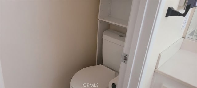 bathroom featuring toilet