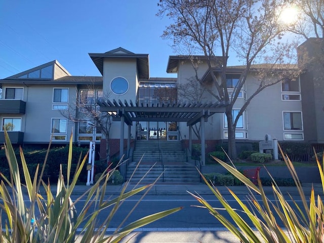 surrounding community featuring a pergola