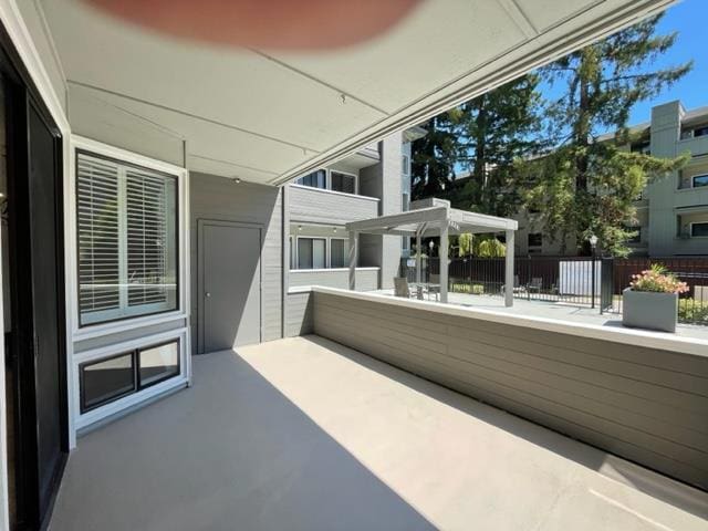 view of patio with a balcony