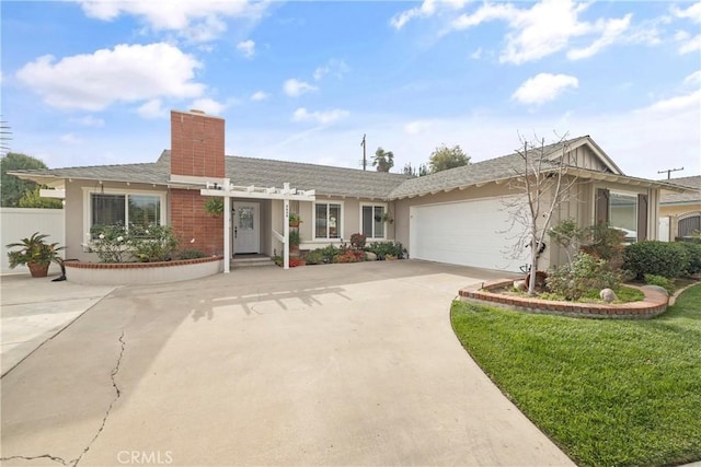 ranch-style home featuring a front lawn and a garage