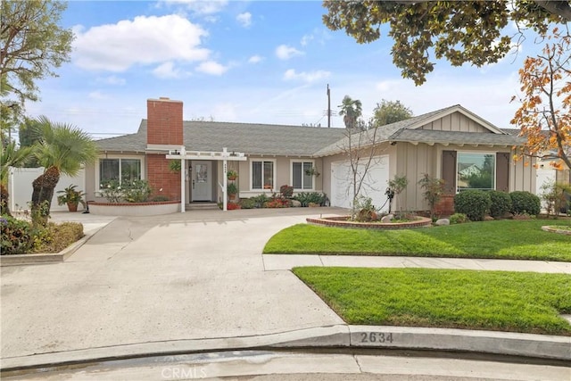 single story home with a front yard and a garage